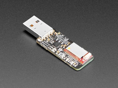 Bluefruit LE Sniffer - Bluetooth®Low Energy 4.0 - nRF5182 - Firmware Version 2 - Angled shot of bluetooth sniffer device.