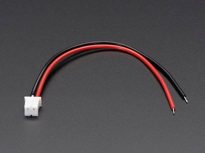 JST PH 2-Pin Cable - Female Connector 100mm - Top view shot of a red and black JST PH 2-Pin Cable to Female Connector - 100mm.