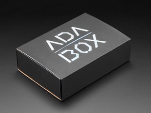 Angled shot of black box that reads "ADABOX".