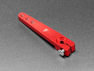Angled shot of red, metal, servo arm.